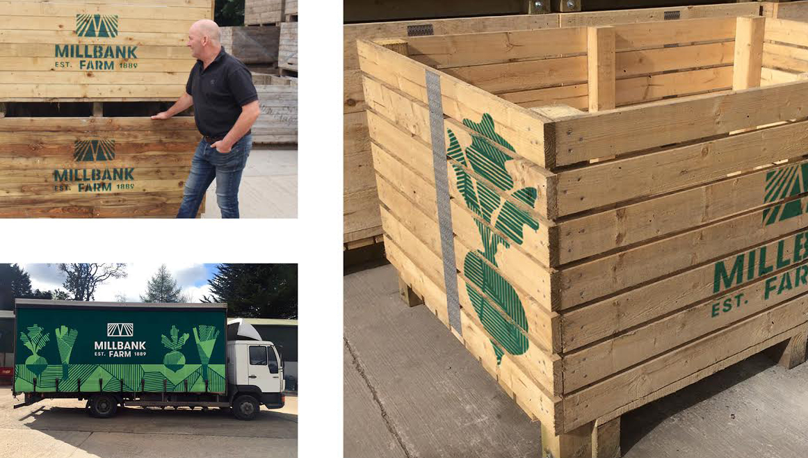 applying a brand to a lorry and wooden pallets