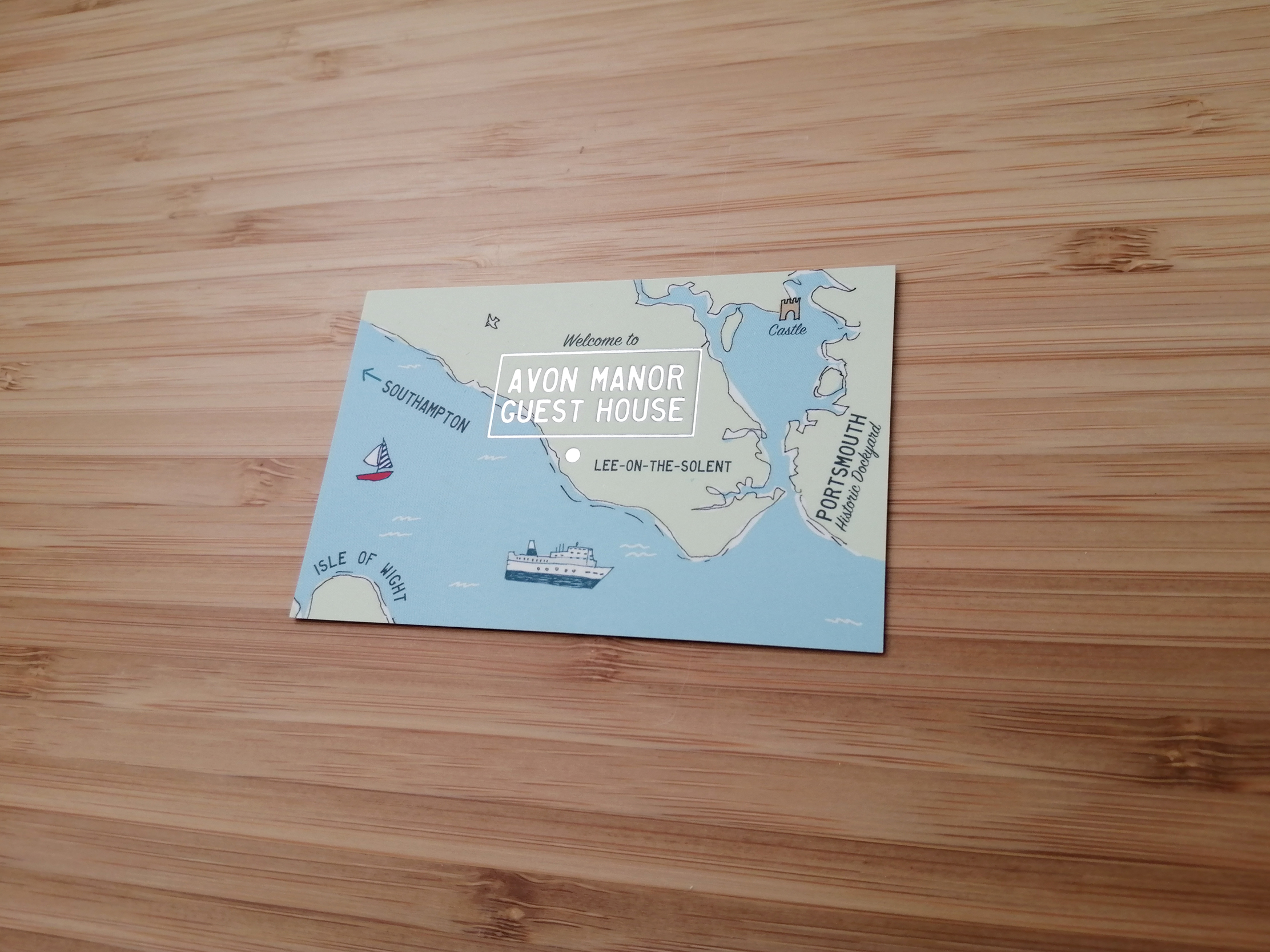 Silver foil business card for Avon Manor guest house