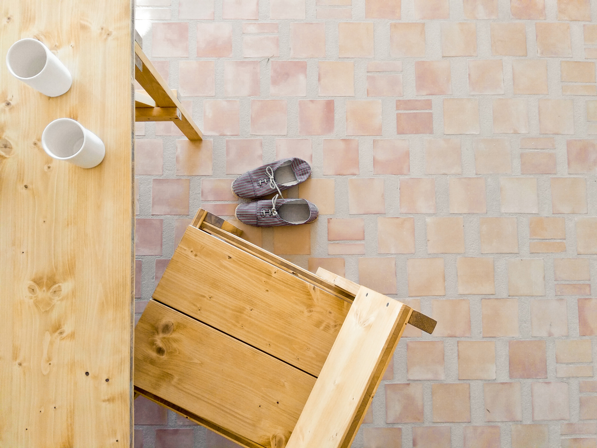 Terracotta floor tiles and natural wood