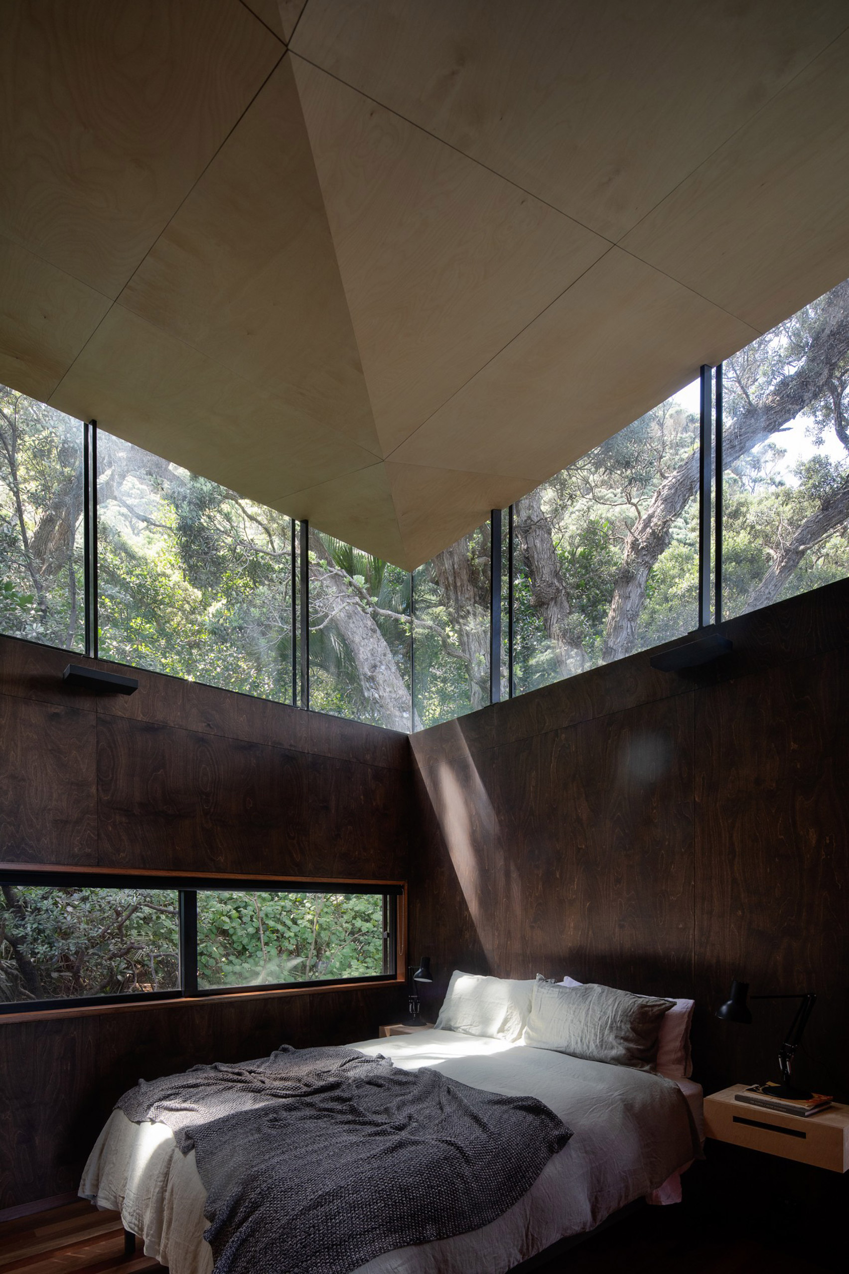 Modern design bedroom surrounded by trees