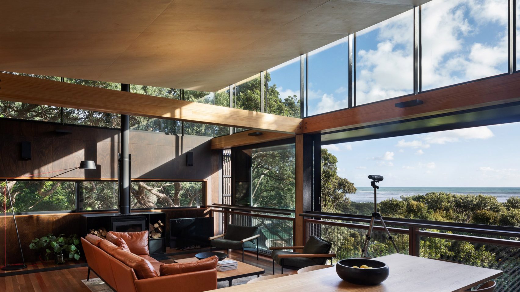 House with views to the sea surrounded by trees in New Zealand