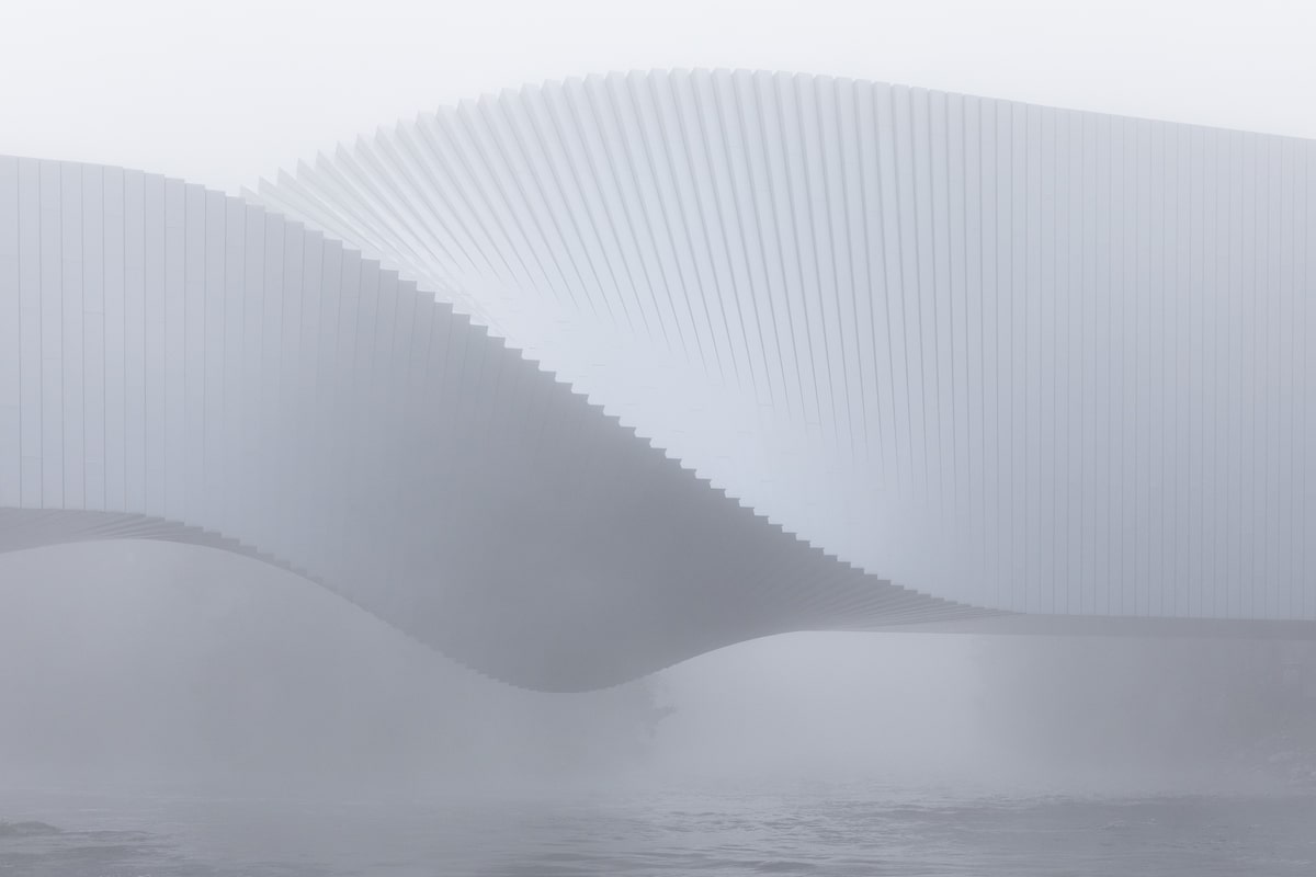 Sculpture bridge doubles as a museum twisting across the waters in Norway