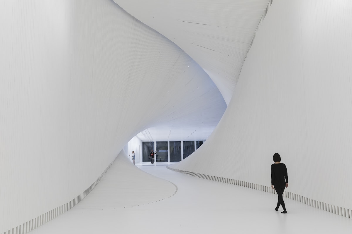 Sculpture bridge doubles as a museum twisting across the waters in Norway