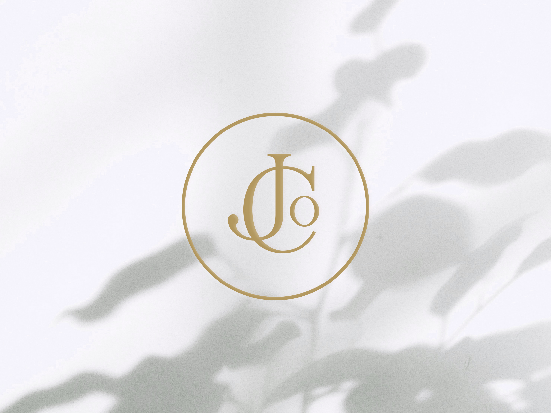 Jo and Co Home logo emblem presented on blush pink and dark blue backgrounds