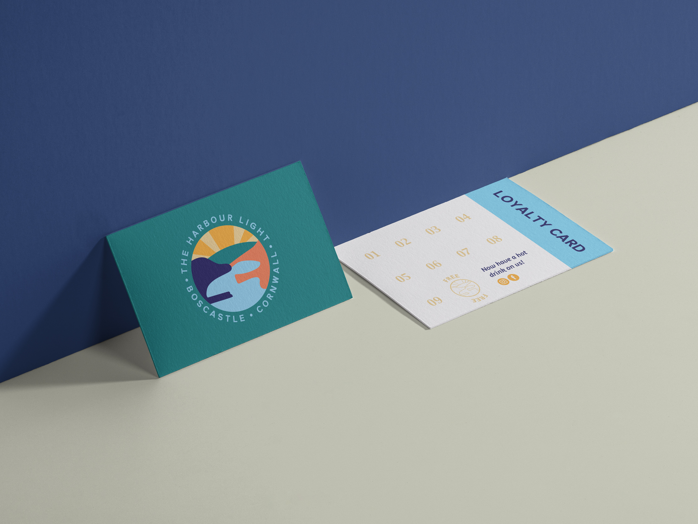 Teal and cream loyalty card design for The Harbour Light cafe